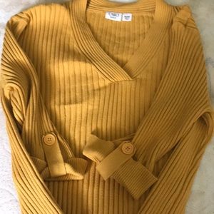 Woman’s mustard yellow shirt